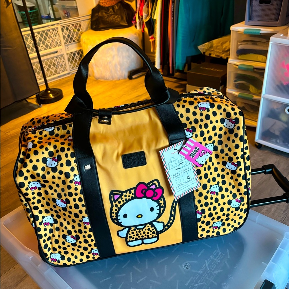 Hello Kitty, duffel bag with wheels new with tags! 🏷️ 🔥🔥🔥🔥🔥